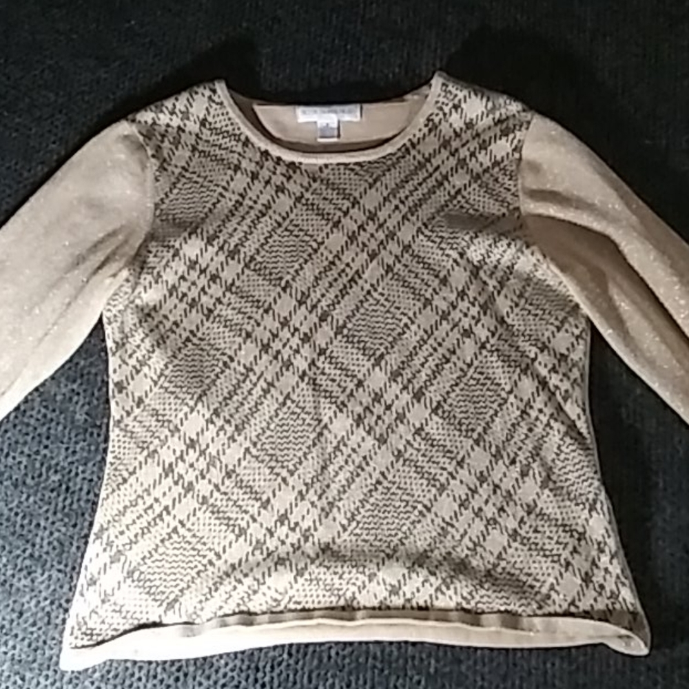 A gold and black shirt